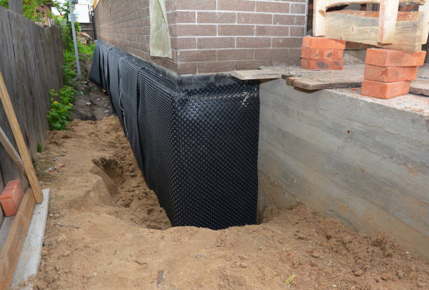 Happy homeowners after waterproofing job in Ontario